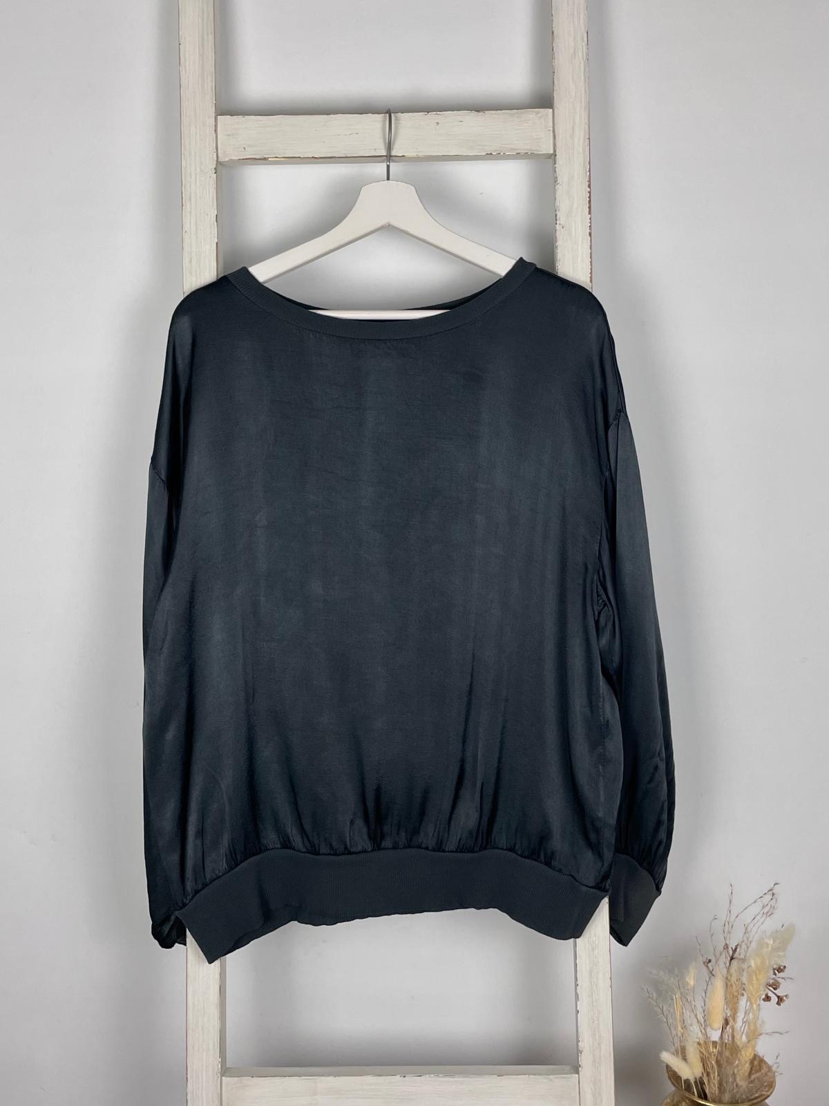 Glänzende Bluse mit Rippsaum