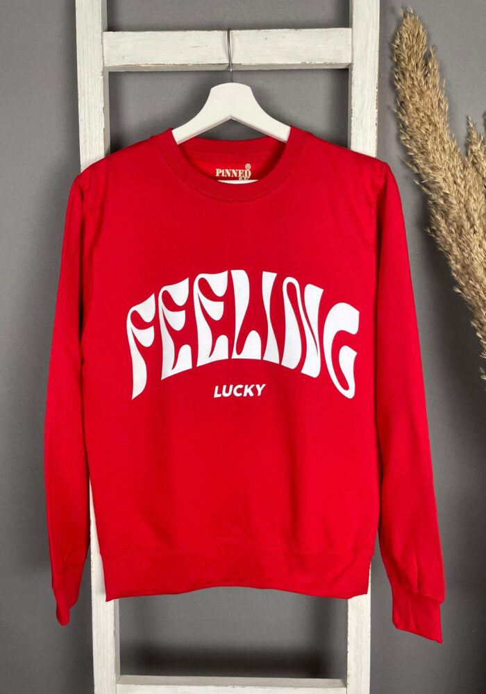 Pinned by K Sweater 'Feeling lucky'